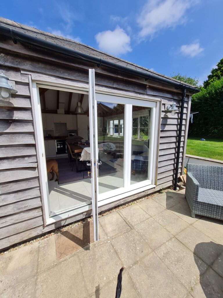 Bespoke bi-fold doors with full paint finish